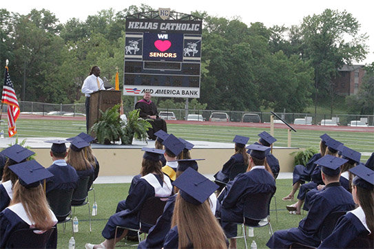 Victor Bell, a teacher and coach at Helias Catholic High School delivers the keynote address to the Helias Catholic Class of 2020 during commencement exercises June 19 at the Crusader Athletic Complex.